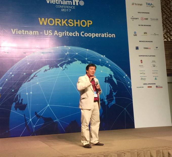 Tu Minh Thien, deputy director of the HCM City Agricultural Hi-Tech Park’s management board, speaks at the Vietnam - US Agritech Co-operation Workshop in HCM City on October 20