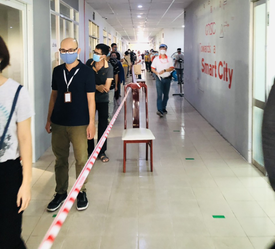 Employees waited in line to take samples for Covid-19 testing